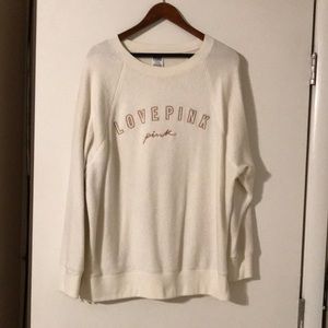 PINK cream colored sweatshirt. Size medium